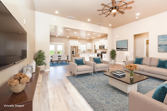 30 Country Club Dr, Farwell, TX 79325 - living room featuring light wood finished floors, ceiling fan, and recessed lighting