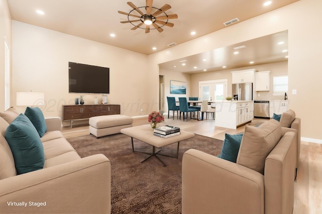 30 Country Club Dr, Farwell, TX 79325 - living area with visible vents, baseboards, ceiling fan, light wood-style floors, and recessed lighting