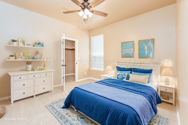 30 Country Club Dr, Farwell, TX 79325 - bedroom with baseboards, ceiling fan, light carpet, and a spacious closet