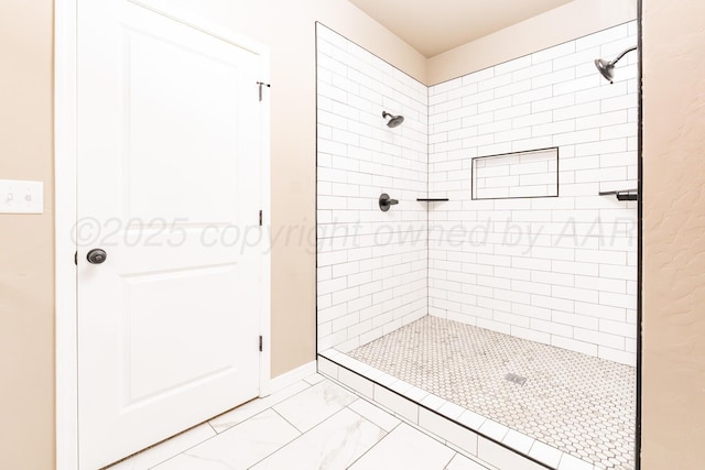 30 Country Club Dr, Farwell, TX 79325 - bathroom featuring a tile shower and marble finish floor