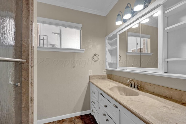 bathroom with baseboards, walk in shower, ornamental molding, vanity, and tile patterned flooring
