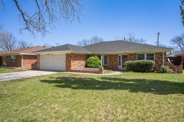 ranch-style house featuring a front yard, brick siding, a garage, and concrete driveway