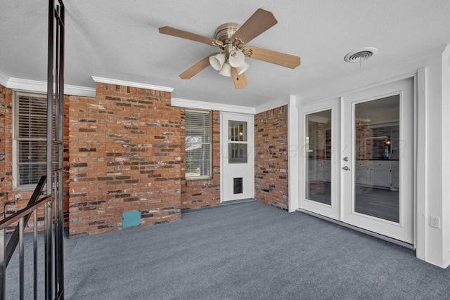 view of patio / terrace featuring visible vents and ceiling fan
