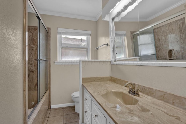 bathroom with bath / shower combo with glass door, toilet, crown molding, vanity, and tile patterned flooring
