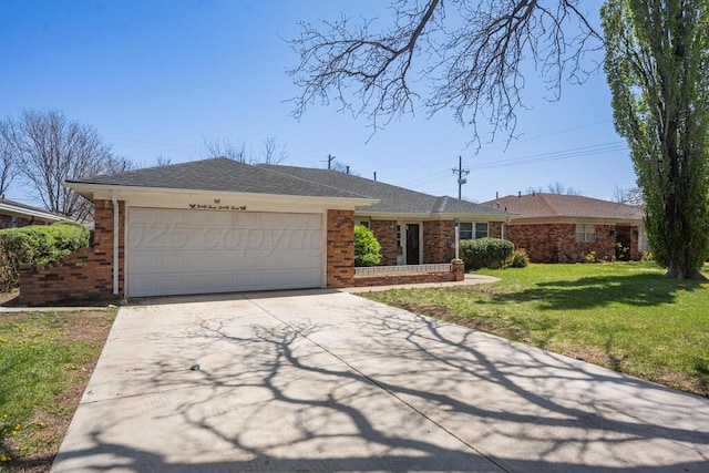 ranch-style home featuring a garage, a front yard, driveway, and brick siding