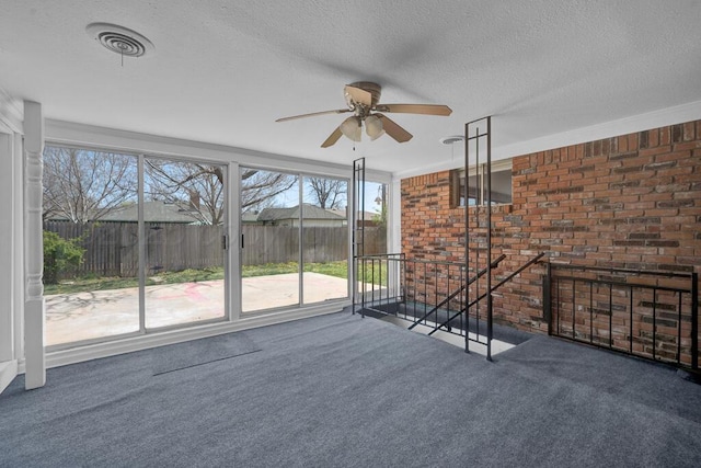 exterior space with visible vents and plenty of natural light