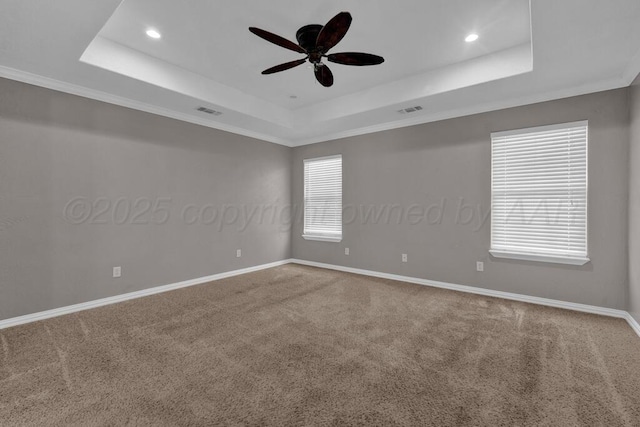 1800 Berkley Ct, Amarillo, TX 79118 - spare room featuring a tray ceiling, ceiling fan, carpet flooring, and recessed lighting