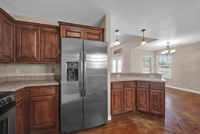 1800 Berkley Ct, Amarillo, TX 79118 - kitchen featuring appliances with stainless steel finishes, a chandelier, backsplash, and pendant lighting