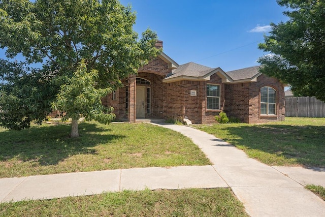 1800 Berkley Ct, Amarillo, TX 79118 - view of front of property with brick siding and a chimney