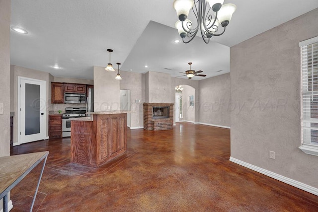 1800 Berkley Ct, Amarillo, TX 79118 - kitchen with stainless steel appliances, finished concrete floors, ceiling fan, a chandelier, and brown cabinets