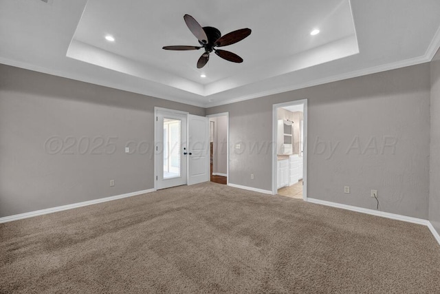 1800 Berkley Ct, Amarillo, TX 79118 - unfurnished room featuring a tray ceiling, light carpet, ceiling fan, and recessed lighting