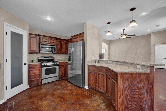 1800 Berkley Ct, Amarillo, TX 79118 - kitchen featuring stainless steel appliances, finished concrete floors, a peninsula, a ceiling fan, and decorative light fixtures