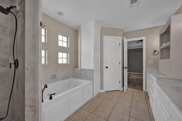 1800 Berkley Ct, Amarillo, TX 79118 - bathroom with a bath, tile patterned flooring, vanity, and a marble finish shower