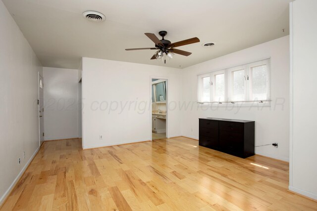 3607 Julie Dr, Amarillo, TX 79109 - unfurnished bedroom with light wood-style flooring and baseboards