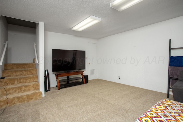 3607 Julie Dr, Amarillo, TX 79109 - carpeted living room featuring stairway and a textured ceiling