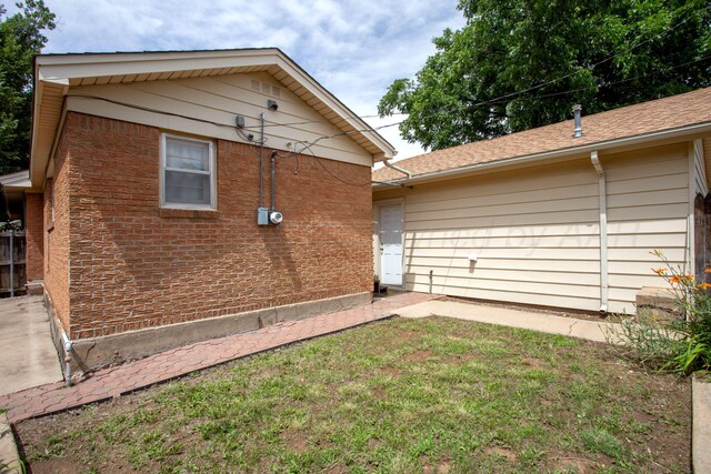 3607 Julie Dr, Amarillo, TX 79109 - view of home's exterior featuring a yard