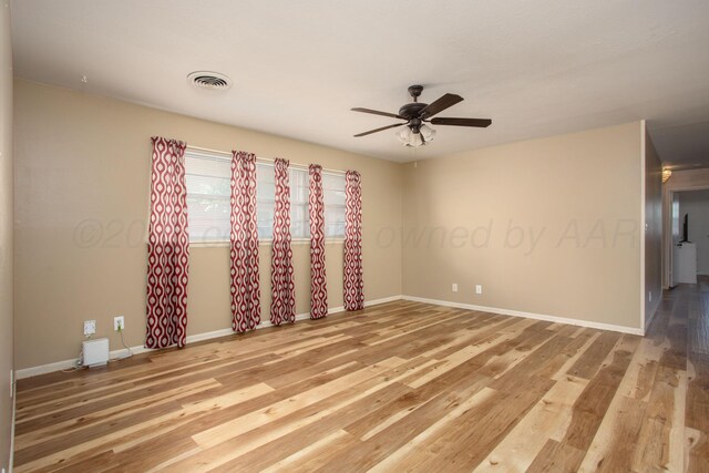 3607 Julie Dr, Amarillo, TX 79109 - unfurnished room with ceiling fan, light wood-type flooring, and baseboards