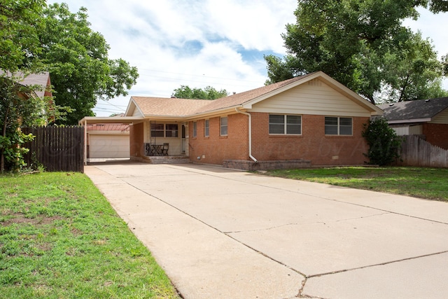 3607 Julie Dr, Amarillo, TX 79109 - ranch-style home featuring brick siding, driveway, an attached garage, and covered porch