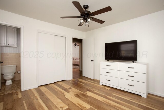 3607 Julie Dr, Amarillo, TX 79109 - unfurnished bedroom with light wood-style floors, a closet, connected bathroom, and ceiling fan
