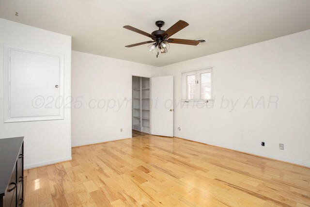 3607 Julie Dr, Amarillo, TX 79109 - unfurnished bedroom featuring light wood-type flooring, baseboards, and ceiling fan