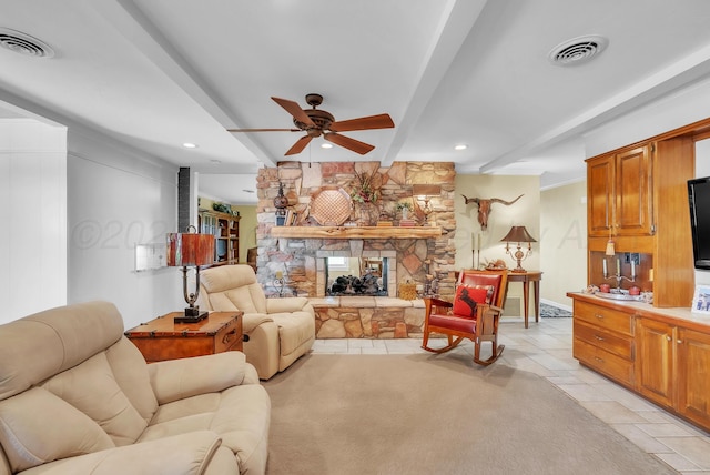 3465 Fm 1058, Hereford, TX 79045 - living room featuring a ceiling fan, beam ceiling, a stone fireplace, recessed lighting, and light tile patterned floors