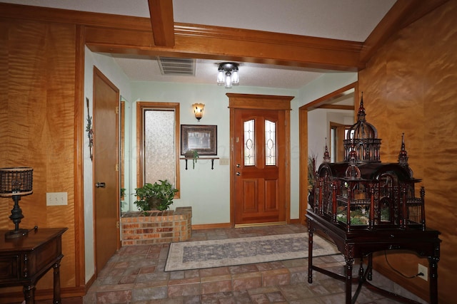 3508 Reeder Dr, Amarillo, TX 79121 - foyer entrance with stone finish floor, visible vents, and baseboards