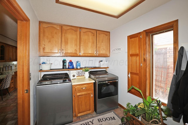 3508 Reeder Dr, Amarillo, TX 79121 - kitchen featuring brown cabinetry, independent washer and dryer, and light countertops