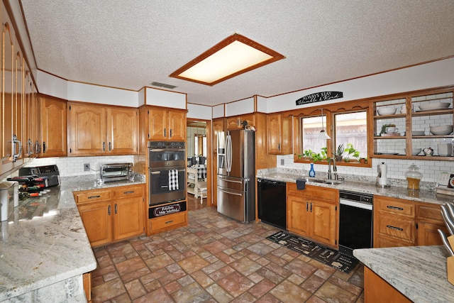 3508 Reeder Dr, Amarillo, TX 79121 - kitchen featuring dishwasher, stainless steel refrigerator with ice dispenser, visible vents, double oven, and a sink