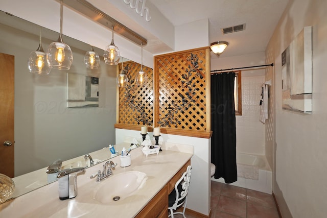 3508 Reeder Dr, Amarillo, TX 79121 - bathroom with shower / bath combination with curtain, vanity, tile patterned flooring, visible vents, and toilet