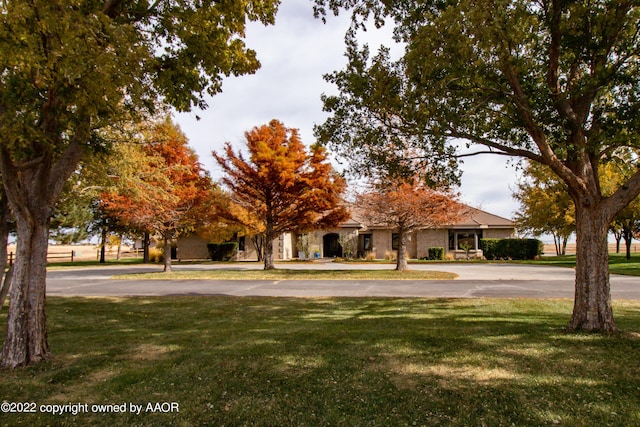 exterior space featuring a front yard