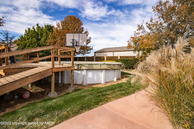 exterior space featuring a covered pool