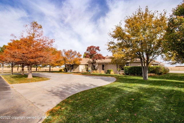 view of front of home with a front yard