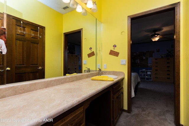 bathroom with vanity and ceiling fan