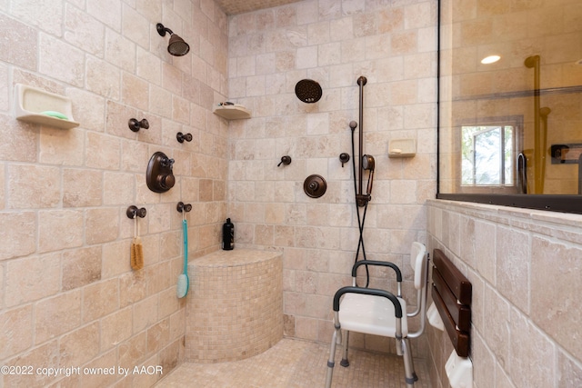 bathroom featuring tiled shower