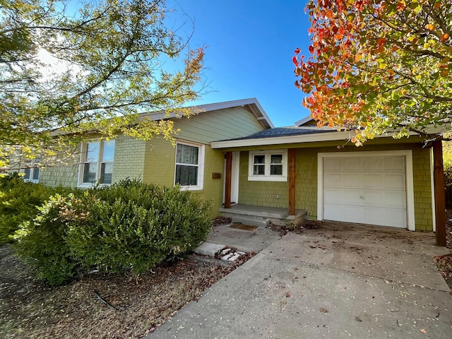 view of front of property featuring a garage