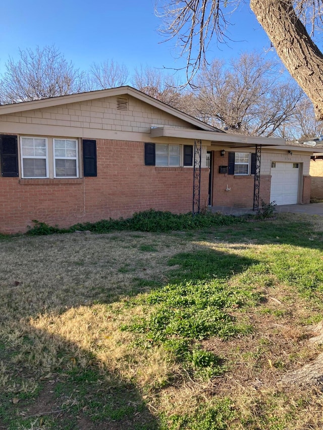 rear view of property with a sunroom and a yard