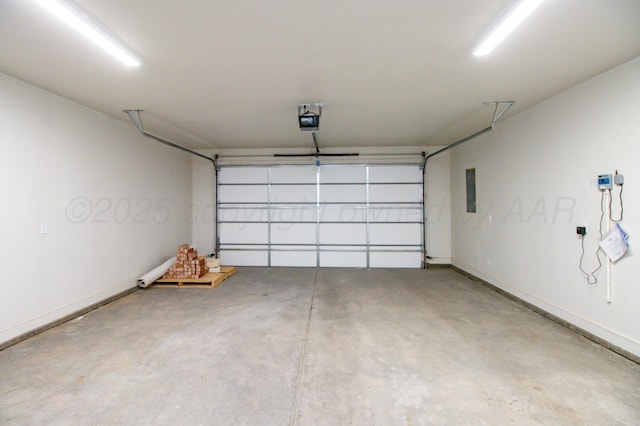 8303 City View Dr, Amarillo, TX 79118 - garage with a garage door opener and baseboards