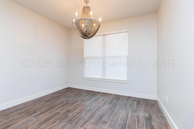 8303 City View Dr, Amarillo, TX 79118 - empty room with a chandelier, dark wood finished floors, and baseboards