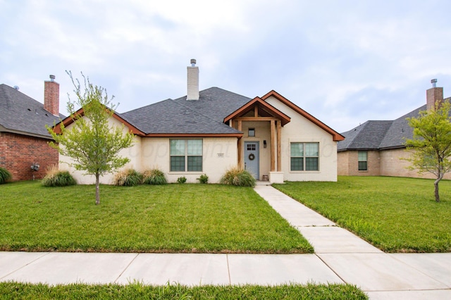 8303 City View Dr, Amarillo, TX 79118 - view of front facade with a front lawn and a chimney