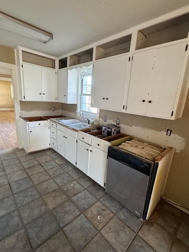 811 S Palo Duro St, Amarillo, TX 79106 - kitchen featuring dishwasher, white cabinets, and dark stone finish flooring