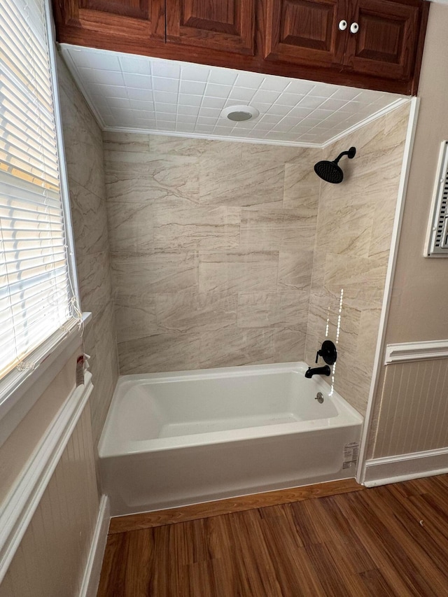 811 S Palo Duro St, Amarillo, TX 79106 - bathroom featuring wood finished floors and shower / tub combination