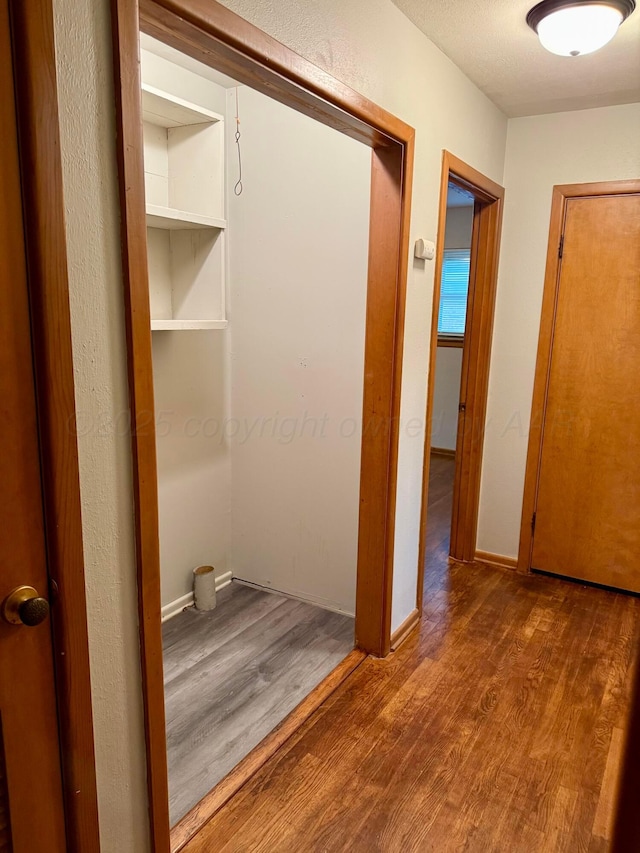 408 Jupiter St, Pampa, TX 79065 - hallway featuring wood finished floors and baseboards
