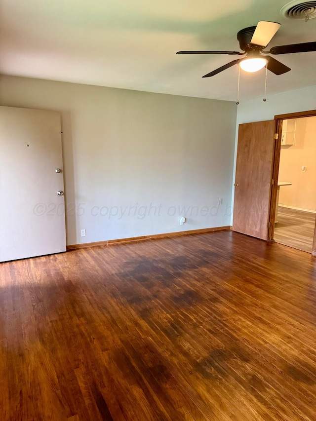 408 Jupiter St, Pampa, TX 79065 - empty room with a ceiling fan, wood finished floors, and baseboards