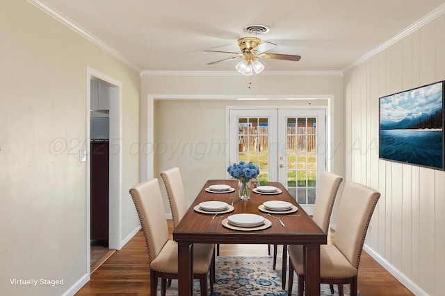 dining space featuring french doors, dark wood-style flooring, crown molding, ceiling fan, and baseboards
