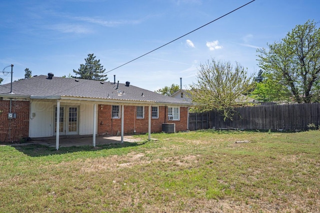 back of house with a patio area, french doors, cooling unit, and brick siding