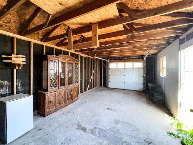 garage featuring fridge