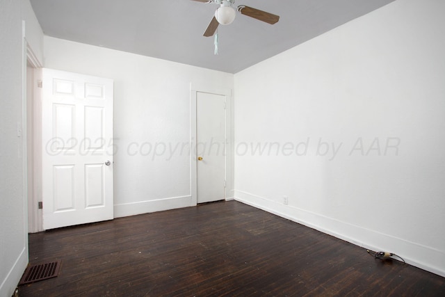 unfurnished bedroom featuring dark wood-type flooring and ceiling fan