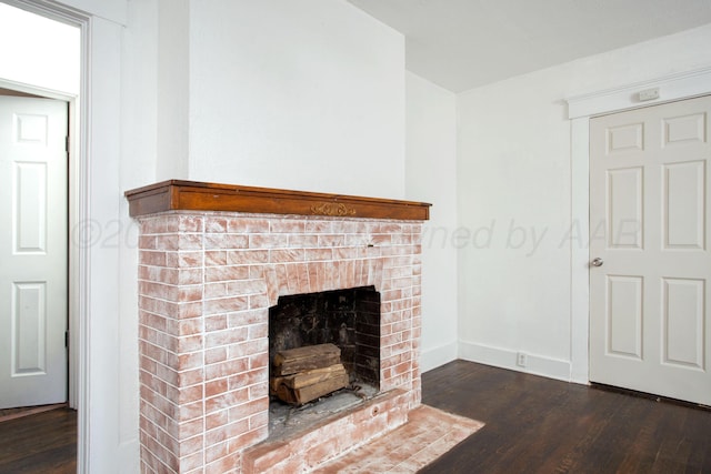 interior details with a fireplace and hardwood / wood-style floors