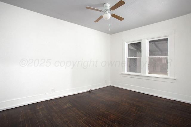 spare room featuring hardwood / wood-style flooring and ceiling fan