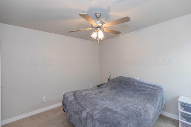 1839 Montaluse Rd, Amarillo, TX 79118 - carpeted bedroom with baseboards and ceiling fan